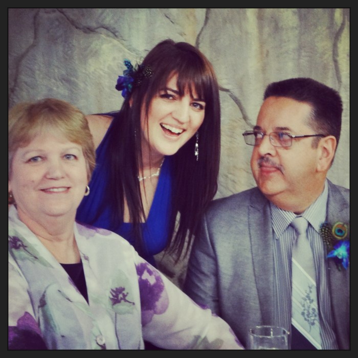 With the parentals:) I have no idea what i did and why i'm laughing so much and my dad is giving me a strange look...but I just adore this picture of the 3 of us. Love these two people so much:) 