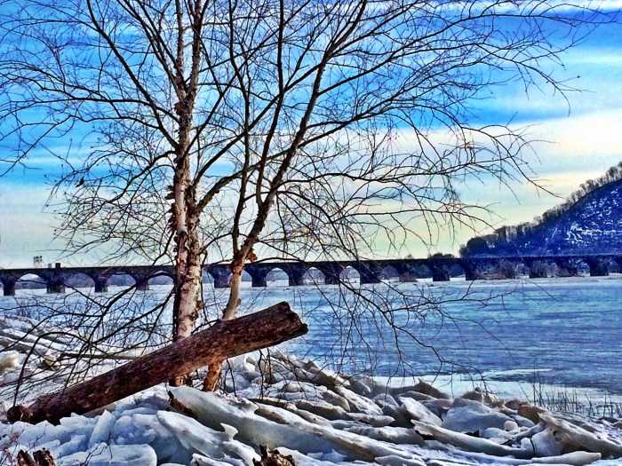 Frozen river with a railway bridge......most amazing thing i've seen in a while
